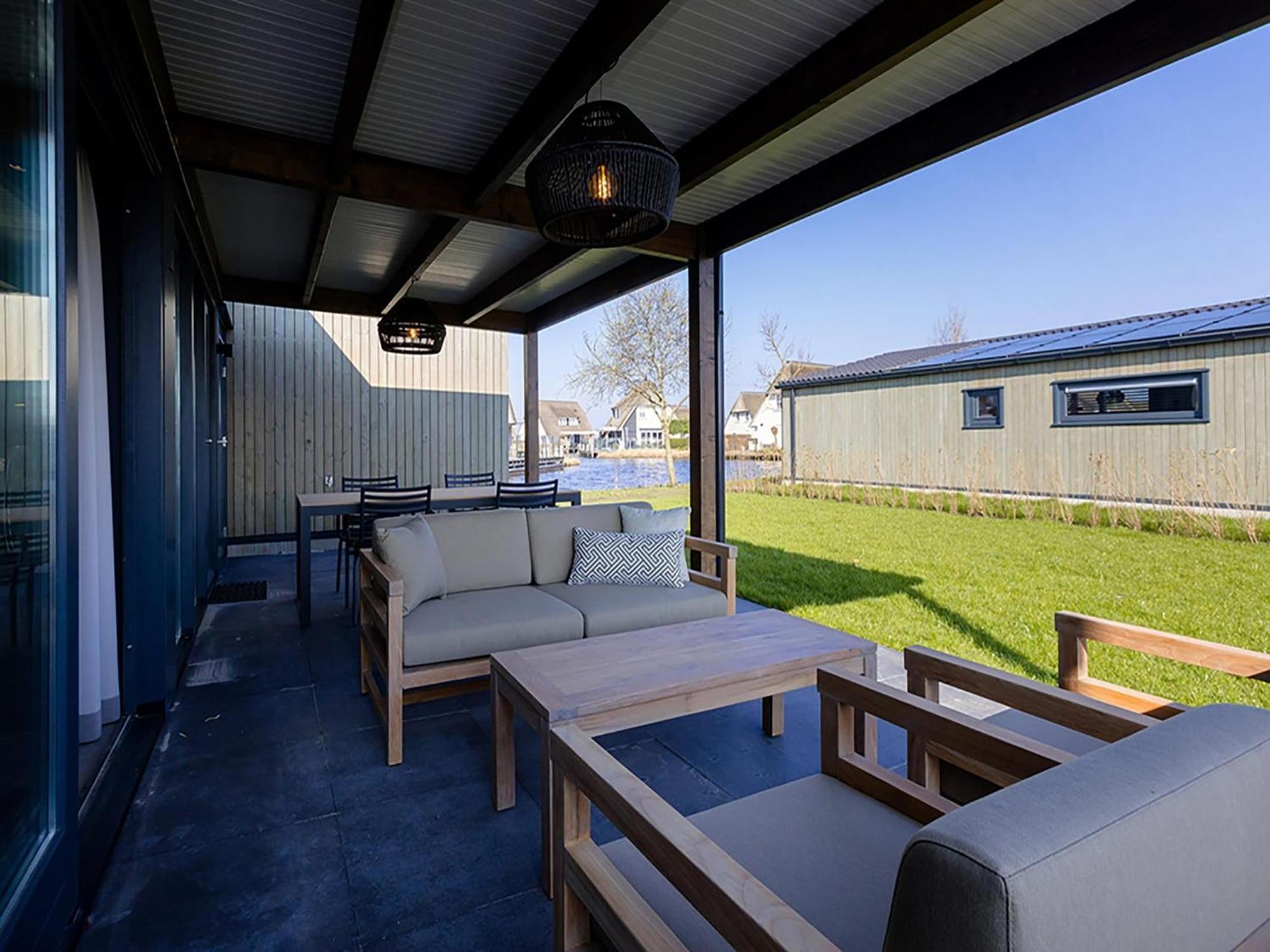 Luxury Docklodge On The Water Delfstrahuizen Exterior photo